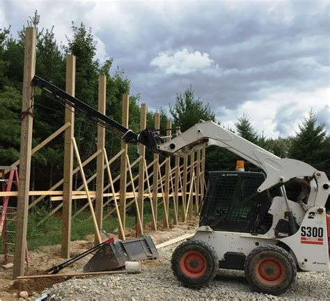 lifting trusses with skid steer|telescoping skid steer truss boom.